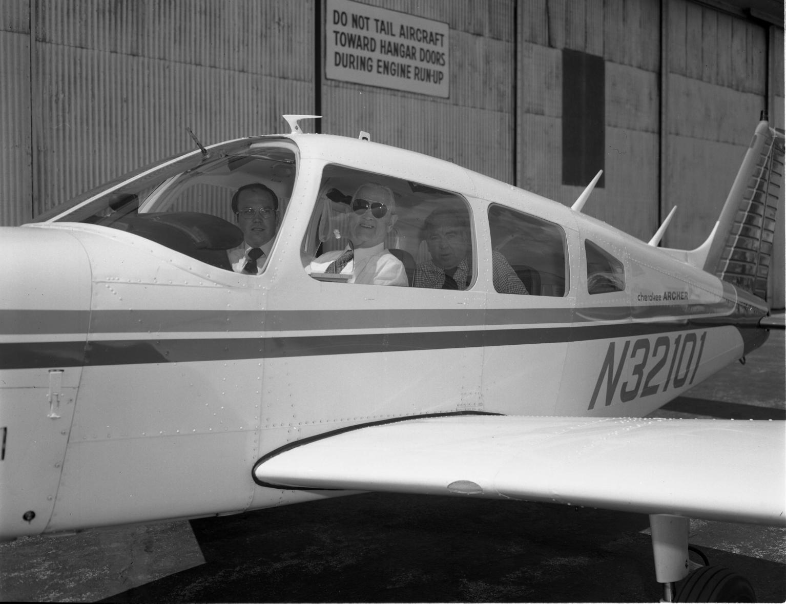 Chip Collins and Doc Draper In An Airplane At Bedford Flight Facility Chip Collins and Doc Draper In An Airplane At Bedford Flight Facility