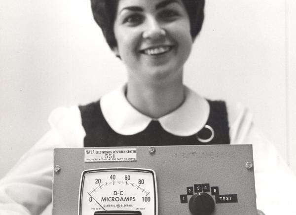 Theresa Thibodeau with Particle Analyzer