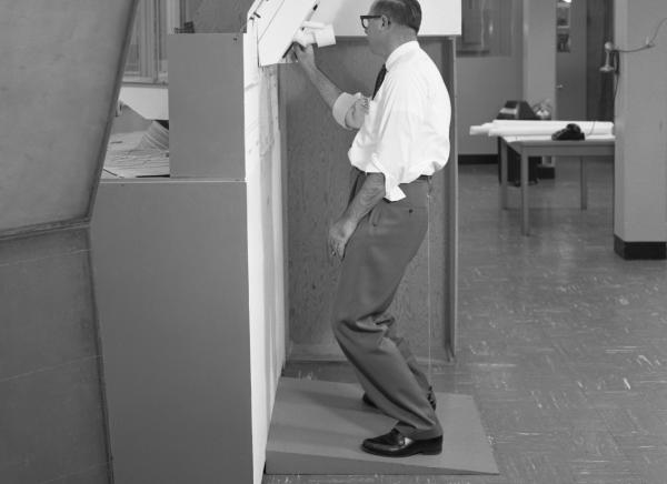 Engineer Al Woodin with Mock-Up of Apollo Primary Guidance, Navigation, and Control System Engineer Al Woodin with Mock-Up of Apollo Primary Guidance, Navigation, and Control System