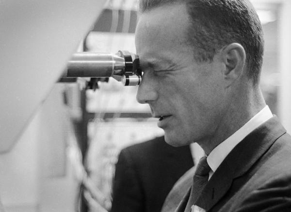 Scott Carpenter Peering Into Primary Guidance, Navigation, and Control System Mock-Up Scott Carpenter Peering Into Primary Guidance, Navigation, and Control System Mock-Up
