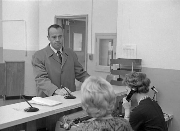 Alan Shepard Signing In at MIT Lab Reception Desk Alan Shepard Signing In at MIT Lab Reception Desk