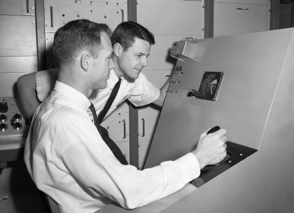 Astronauts Basset and Scott Using a Beckman Computer Astronauts Basset and Scott Using a Beckman Computer