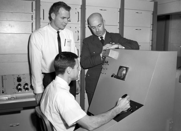 Astronauts Basset and Scott Using a Beckman Computer Astronauts Basset and Scott Using a Beckman Computer