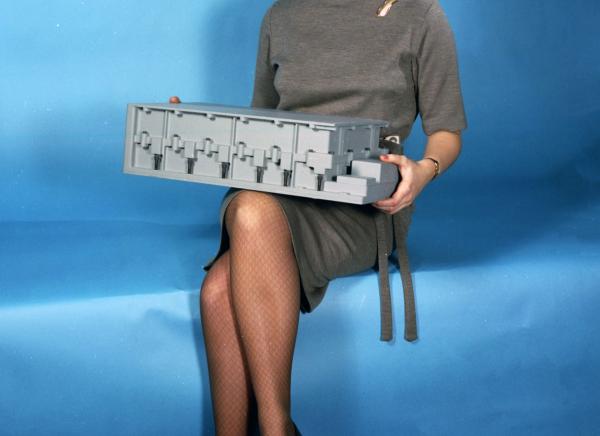 Woman holding Block II Coupling Data Unit Mock-Up Woman holding Block II Coupling Data Unit Mock-Up