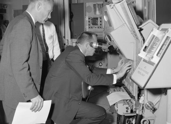 Apollo Astronauts Buzz Aldrin and Alan Shepard Using the Primary Guidance, Navigation, and Control System Apollo Astronauts Buzz Aldrin and Alan Shepard Using the Primary Guidance, Navigation, and Control System