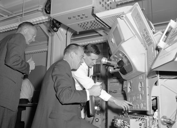 Astronauts Receiving Instructions from MIT Engineers on the Apollo Primary Guidance, Navigation, and Control System Astronauts Receiving Instructions from MIT Engineers on the Apollo Primary Guidance, Navigation, and Control System