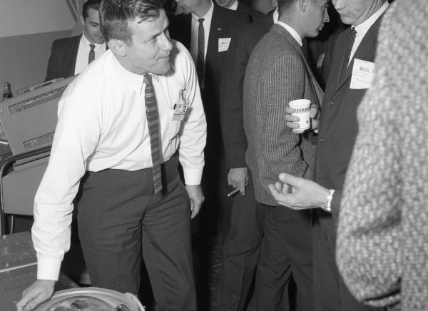 Apollo Astronauts Michael Collins, James Lovell, and MIT Engineer Manny Kramer with the IMU Apollo Astronauts Michael Collins, James Lovell, and MIT Engineer Manny Kramer with the IMU