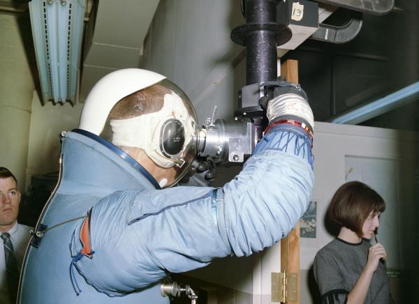 Astronaut in Space Suit Tests Optics Eye Relief Astronaut in Space Suit Tests Optics Eye Relief