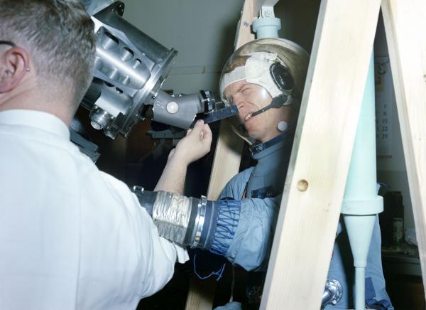 Astronaut Schweickart Testing the Command Module Optics System in a Spacesuit Astronaut Schweickart Testing the Command Module Optics System in a Spacesuit