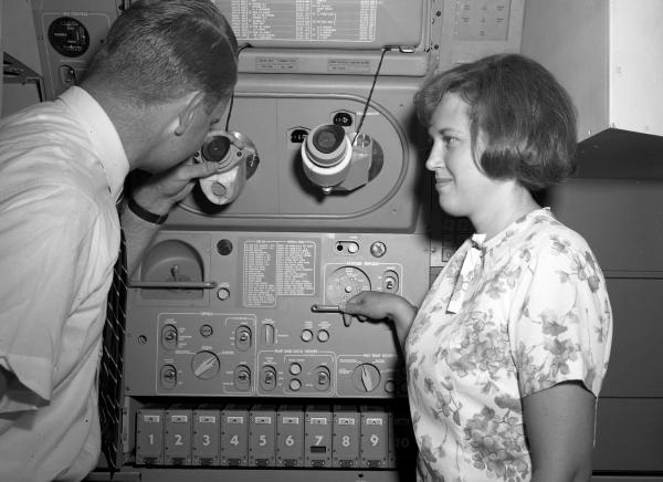 Engineers with the Apollo Primary Guidance, Navigation, and Control System Mock-Up