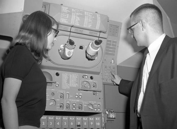 Engineers with the Apollo Primary Guidance, Navigation, and Control System Mock-Up