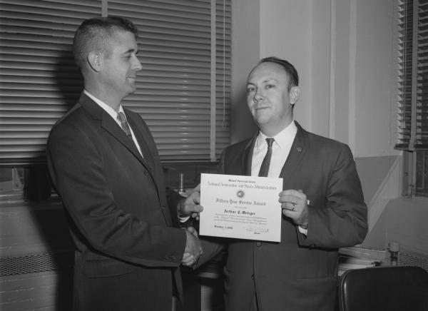 Art Metzger Receiving 15-year Service Certification From NASA