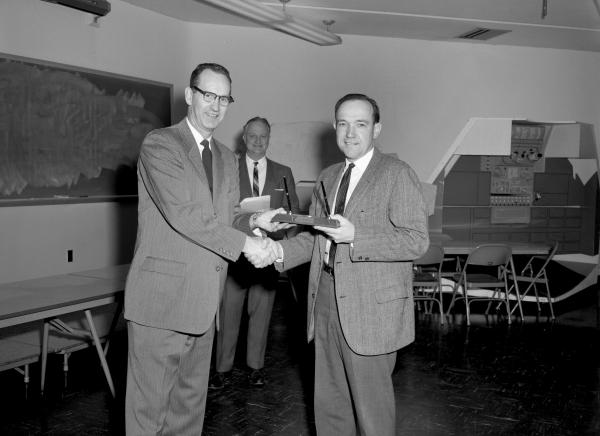 Ralph Ragan Presenting Tom Anderson with the 3% Cost Reduction Award