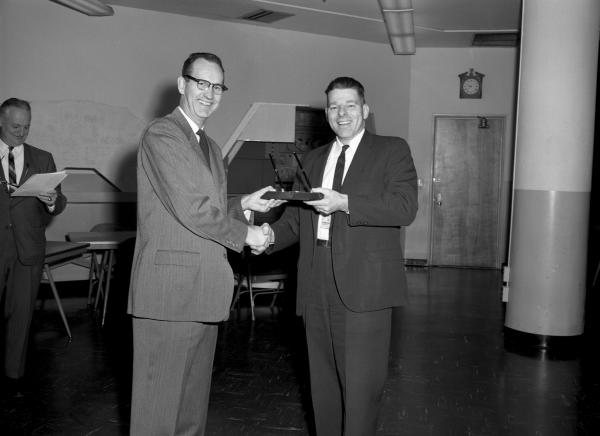 Ralph Ragan Presenting George Mayo with the 3% Cost Reduction Award