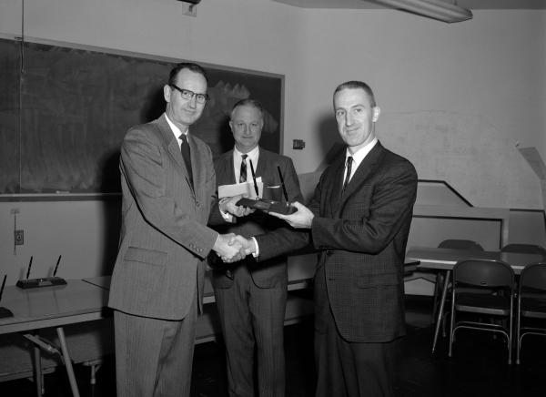 Ragan presents Fitzgibbon with NASA Award