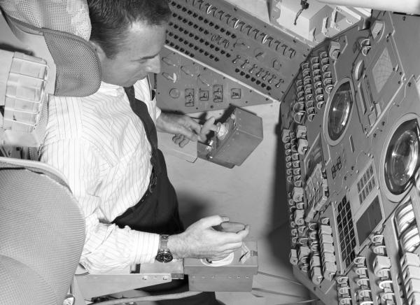 Astronaut Jim Lovell in the Command Module Simulator