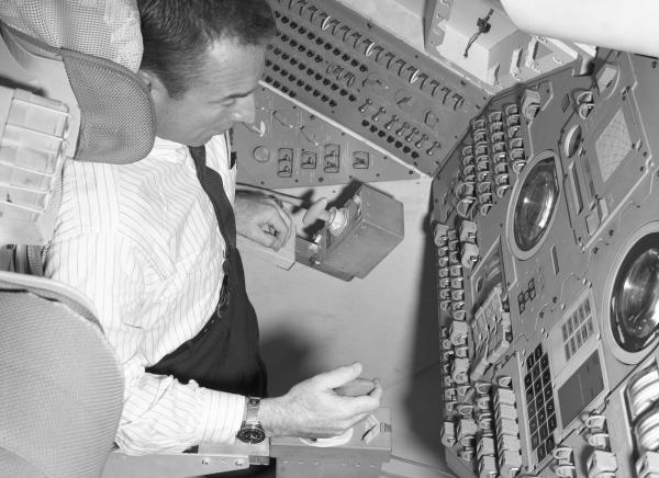 Astronaut Jim Lovell in the Command Module Simulator