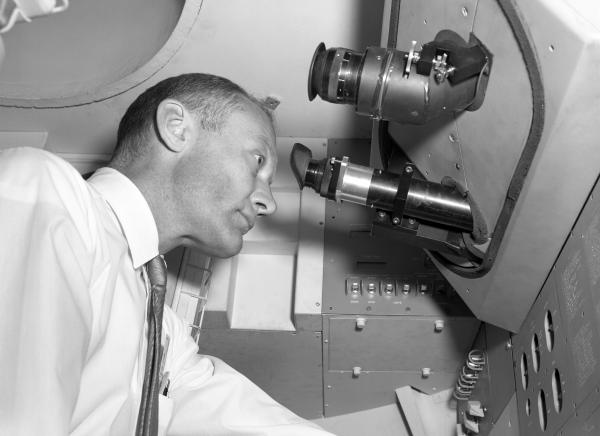 Astronaut Buzz Aldrin in the Command Module Simulator