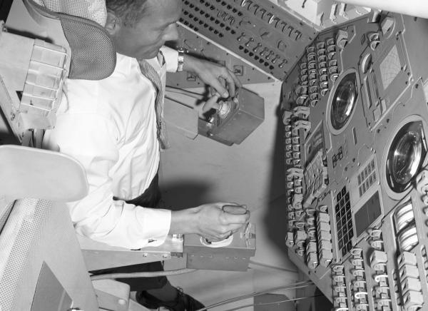 Astronaut Buzz Aldrin in the Command Module Simulator