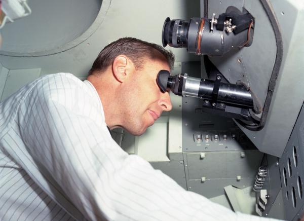 Astronaut Jim Lovell in Command Module Simulator