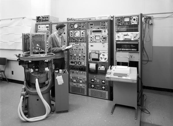 MIT Lab Engineer testing Apollo Analog Computer
