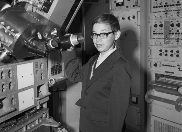 Boy From Florida With Primary Guidance, Navigation, & Control Console Mock-Up Boy From Florida With Primary Guidance, Navigation, & Control Console Mock-Up