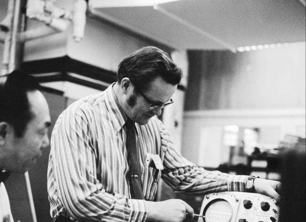 Eldon Hall with Apollo Guidance Computer Testing Equipment