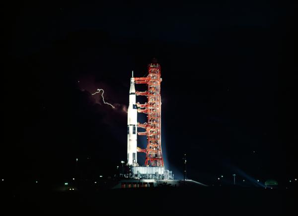 Saturn V Rocket with Lightning