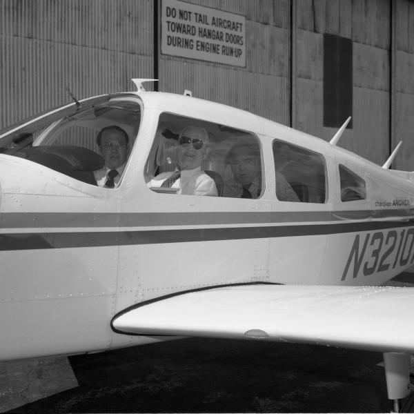 Chip Collins and Doc Draper In An Airplane At Bedford Flight Facility